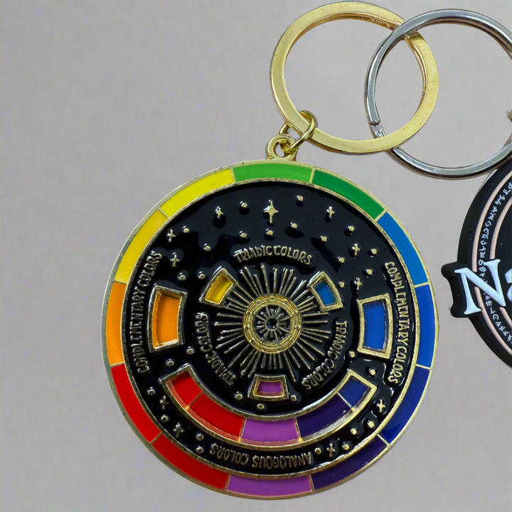 Keychain with rainbow-colored circular design on a white background