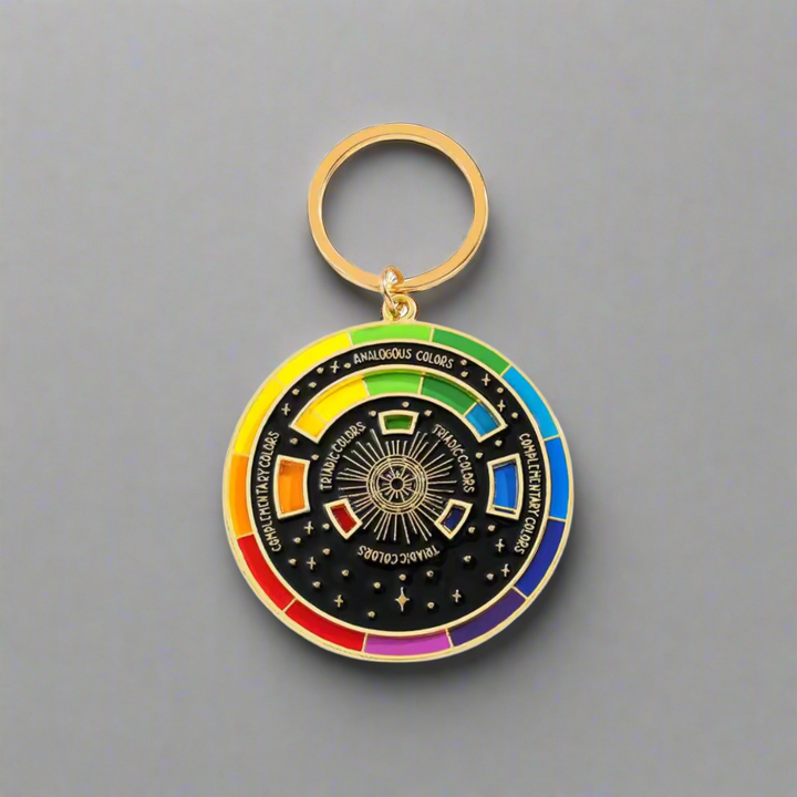 Keychain with rainbow-colored circular design on a white background